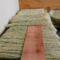Serat daun nanas yang telah diproses dijemur dan dirapikan di atas meja kerja di industri kecil Morobayat sebagai bahan baku bio fabric Totatex.